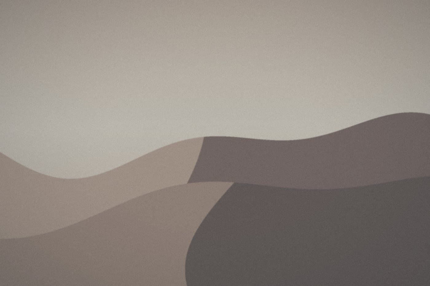 Sand dunes under a flat, grey-beige sky, before editing