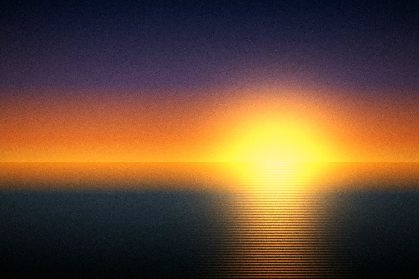 The same sea after Golden Hour: a glowing orange and gold sunset over dark water