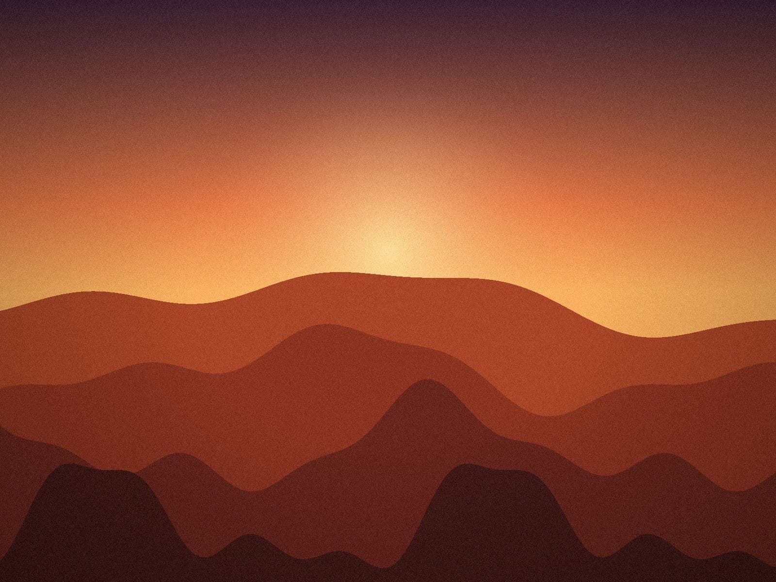 Red dunes under a low orange sun
