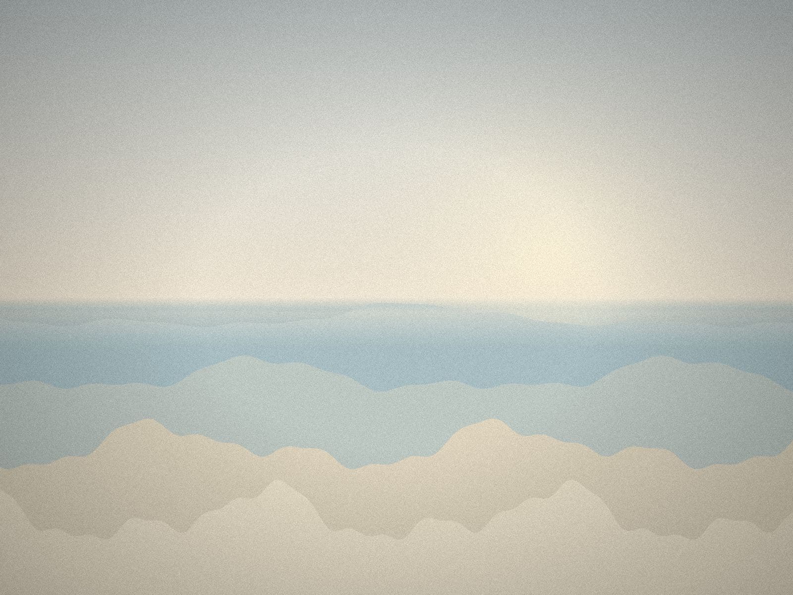 A pale coast at low tide, sandbars fading into a hazy horizon